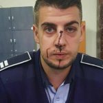 politist batut de interlop video
