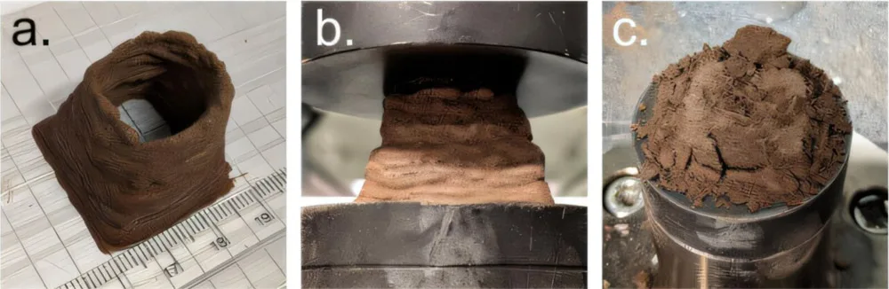 Visible light images of the 3D-printed HSA-ERB based on Martian Global Simulant. (a) after fabrication, (b) during compression testing, and (c) after compression testing.