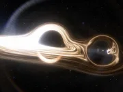 Descoperire fascinantă: două găuri negre care orbitează una în jurul celeilalte au fost observate pentru prima dată două găuri negre care orbitează